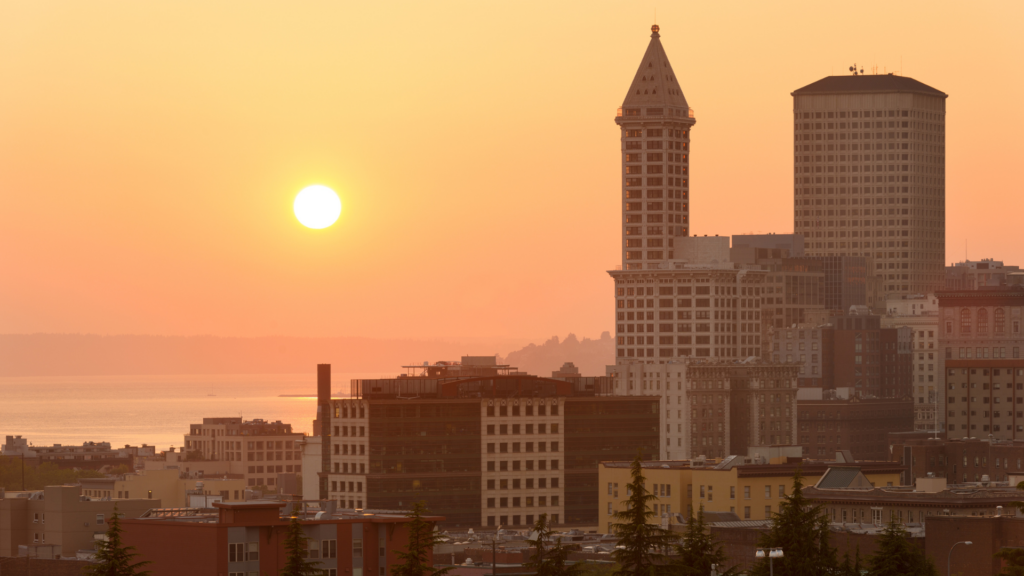 A view looking over Seattle's Pioneer Square neighborhood with the Smith Tower and Federal Building, on a hot, smoky day